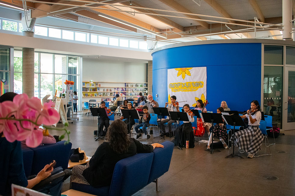 Library violin class student recital at the Vickery Park Branch